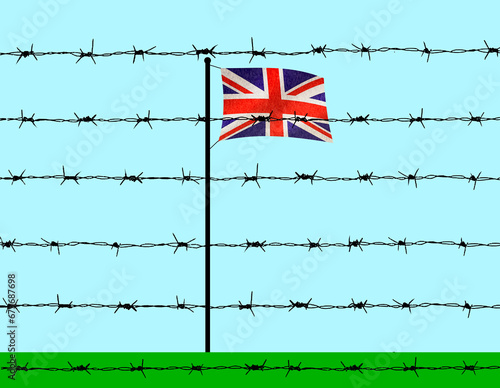 British flag behind barbed wire under blue sky photo