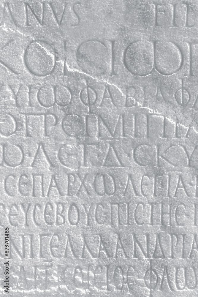 Historical text. Fragment of ancient law (imperial edict at Ancient Greek language), carved on marble block. Vintage background, cover page, monochrome. Kayseri, Turkey (Turkiye)