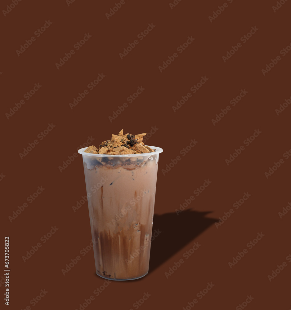 Iced cacao crunchy. plastic cup of dark chocolate blended with cacao nibs and topped with chocolate granola. Iced cacao crunchy. plastic cup of dark chocolate blended with cacao nibs and topped with chocolate granola.
