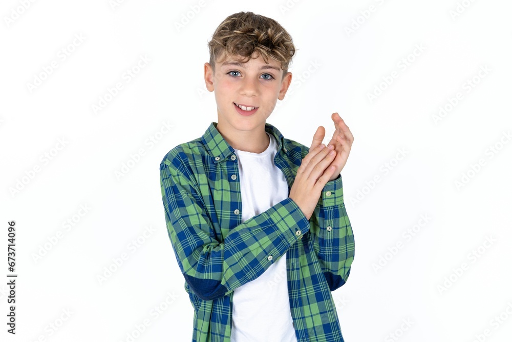Caucasian teen boy clapping and applauding happy and joyful, smiling proud hands together. Caucasian teen boy clapping and applauding happy and joyful, smiling proud hands together.