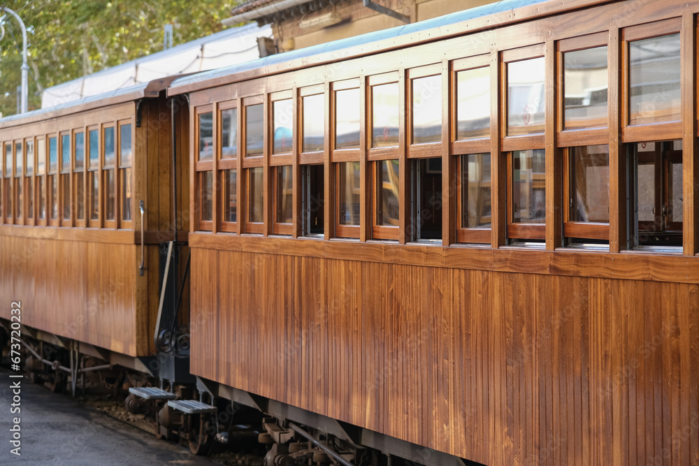 Fototapeta premium Historic train railway from Palma de Mallorca to Soller on Balearic Island named Orange Express scenic ride journey time travel like a century 100 years ago
