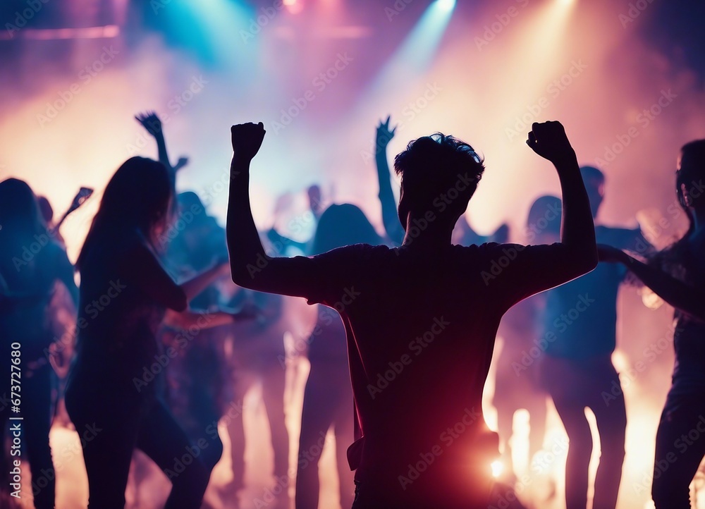silhouettes of people dancing at a crowded party at midnight, colorful lights and smoke at background silhouettes of people dancing at a crowded party at midnight, colorful lights and smoke at background