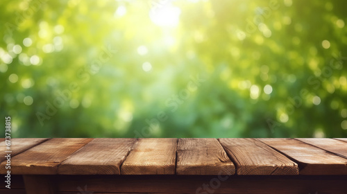 Nature landcape background - Empty rustic wooden table with green defocused background with bokeh lights © Corri Seizinger