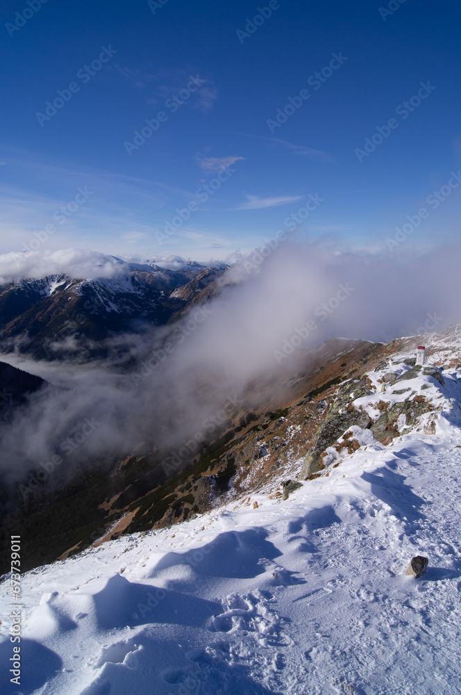 Snowy Trail to the Summit: Hiking the Breathtaking Slopes of Kasprowy Wierch in the Tatras