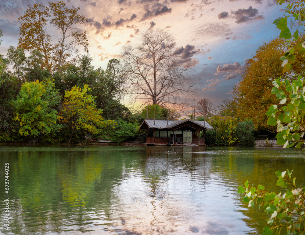 house on the lake at autumn season