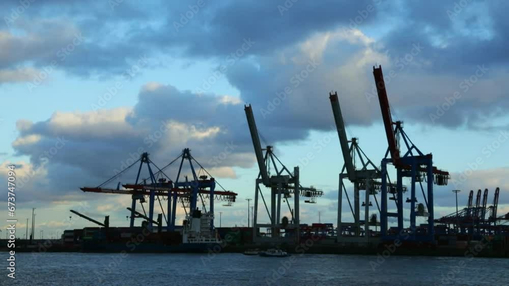Cranes in the backlight, container port, Elbe, Hamburg, Germany, Europe Cranes in the backlight, container port, Elbe, Hamburg, Germany, Europe