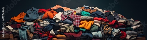 A stack of vector clothing set, second-hand, on a dark background. Generated by AI.