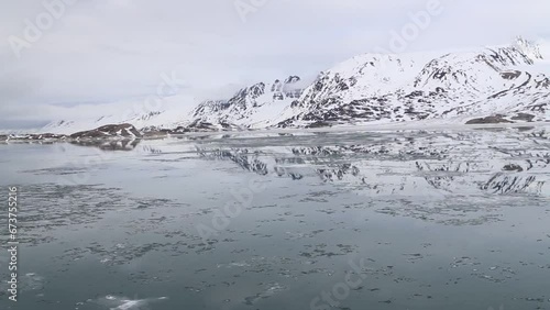 Boat trip in Liefdefjorden along the Monaco Glacier, Spitsbergen Island, Norway, Europe photo