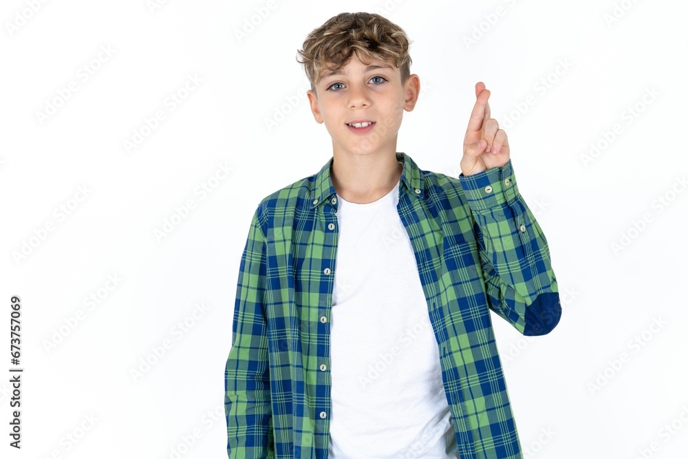 Caucasian teen boy pointing up with fingers number ten in Chinese sign language Shi Caucasian teen boy pointing up with fingers number ten in Chinese sign language Shi
