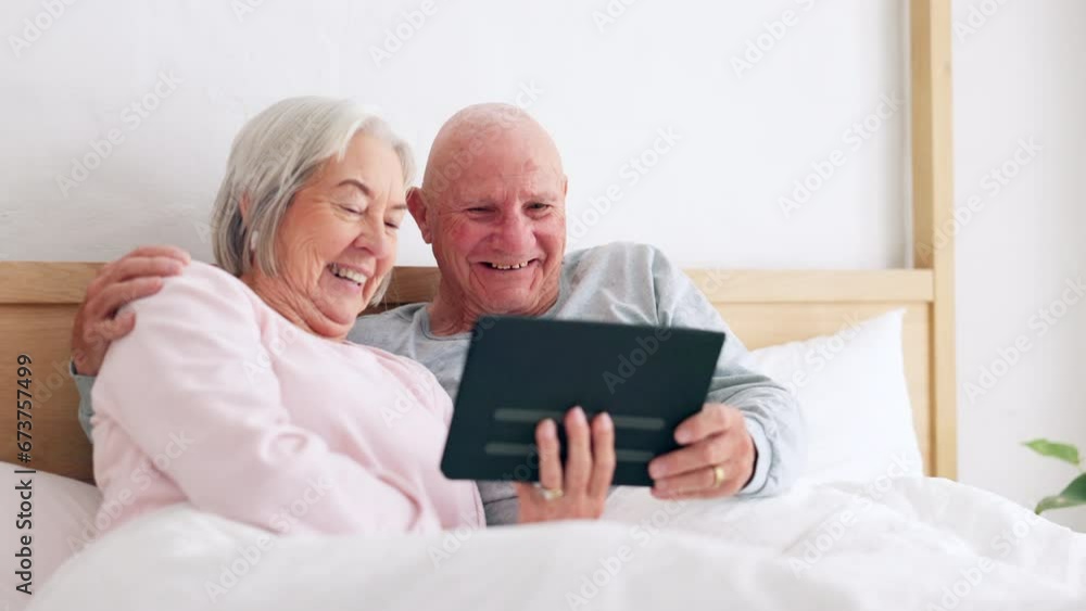 Senior, happy couple and tablet for fun in bedroom with social media, post or meme on app. Elderly woman, man and married with laugh for joke by scroll, browse or reading on internet with connection Senior, happy couple and tablet for fun in bedroom with social media, post or meme on app. Elderly woman, man and married with laugh for joke by scroll, browse or reading on internet with connection