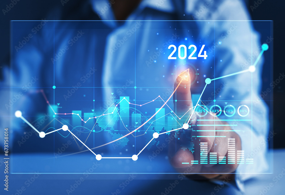 Businessman draw growth graph a year 2024 of business and data analysis