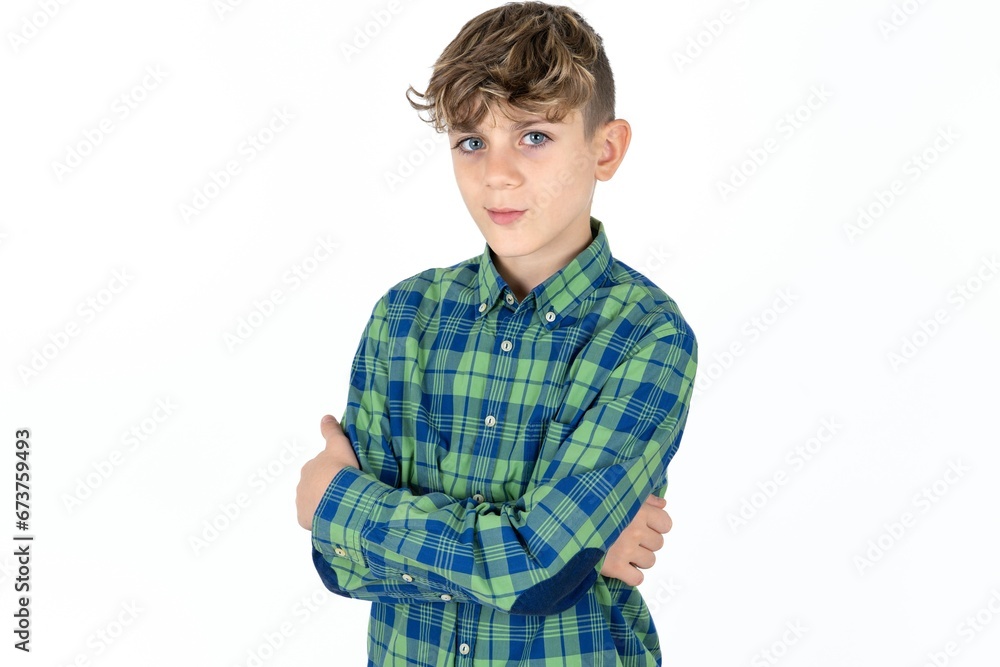 Caucasian teen boy wearing plaid shirt Pointing down with fingers showing advertisement, surprised face and open mouth Caucasian teen boy wearing plaid shirt Pointing down with fingers showing advertisement, surprised face and open mouth