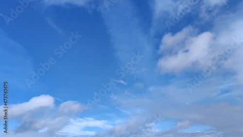 Heavenly landscape of clouds moving early photo