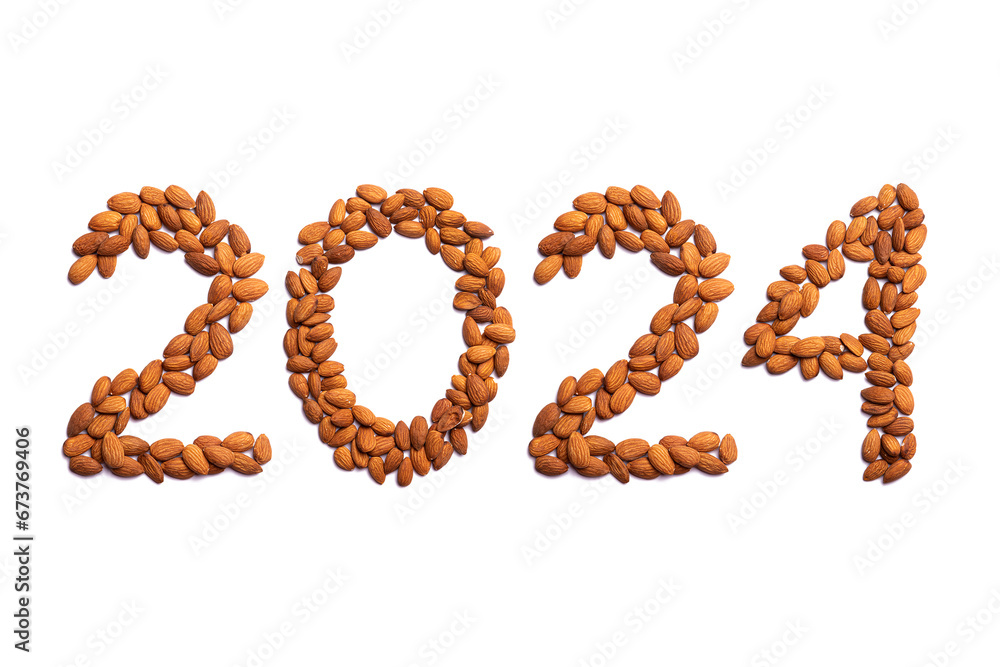 Calendar header number 2024 made of almonds on a white background. Happy New Year 2024 colorful background. Calendar header number 2024 made of almonds on a white background. Happy New Year 2024 colorful background.
