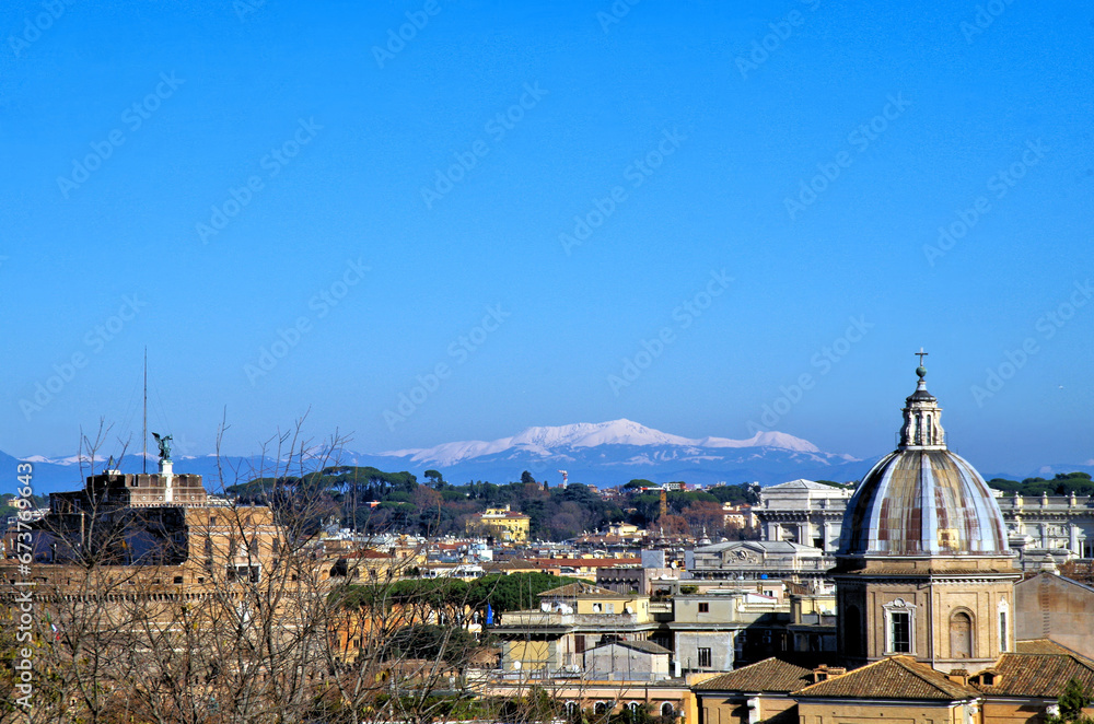 rome's cityscape with  snowy mountains