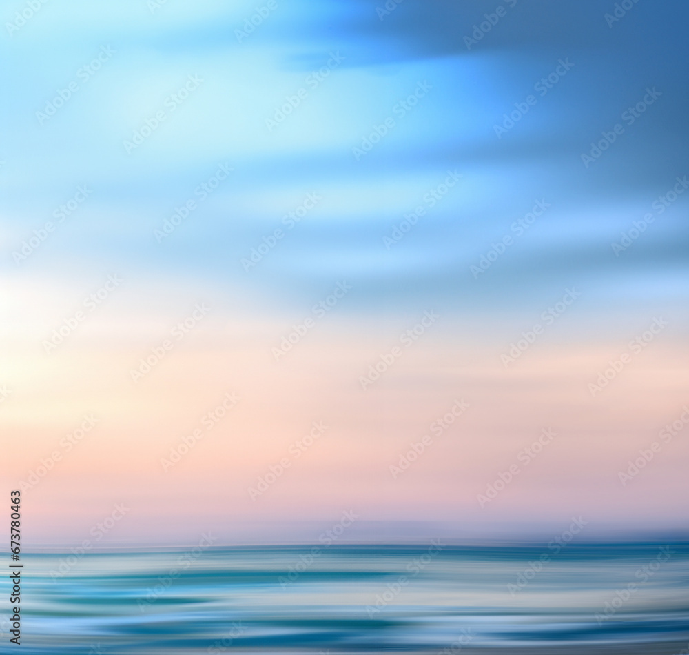 Magnificent view of ocean beneath light pink sky Magnificent view of ocean beneath light pink sky