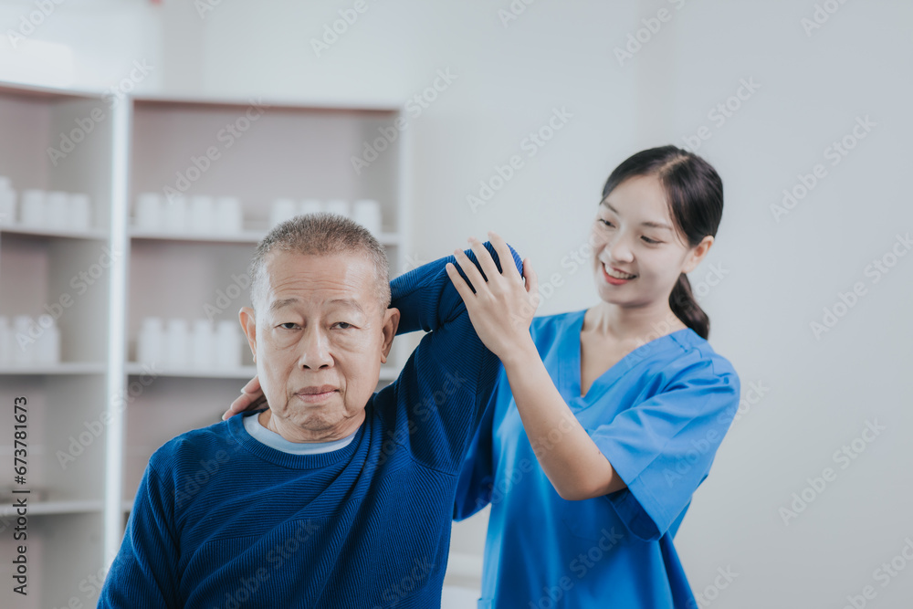 Asian female doctor or nurse exercising with elderly man at hospital Asian female doctor or nurse exercising with elderly man at hospital