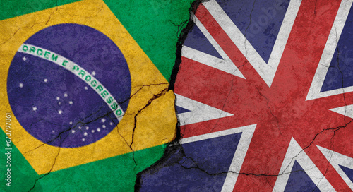 Flags of Brazil and Great Britain texture of concrete wall with cracks, grunge background, military conflict concept