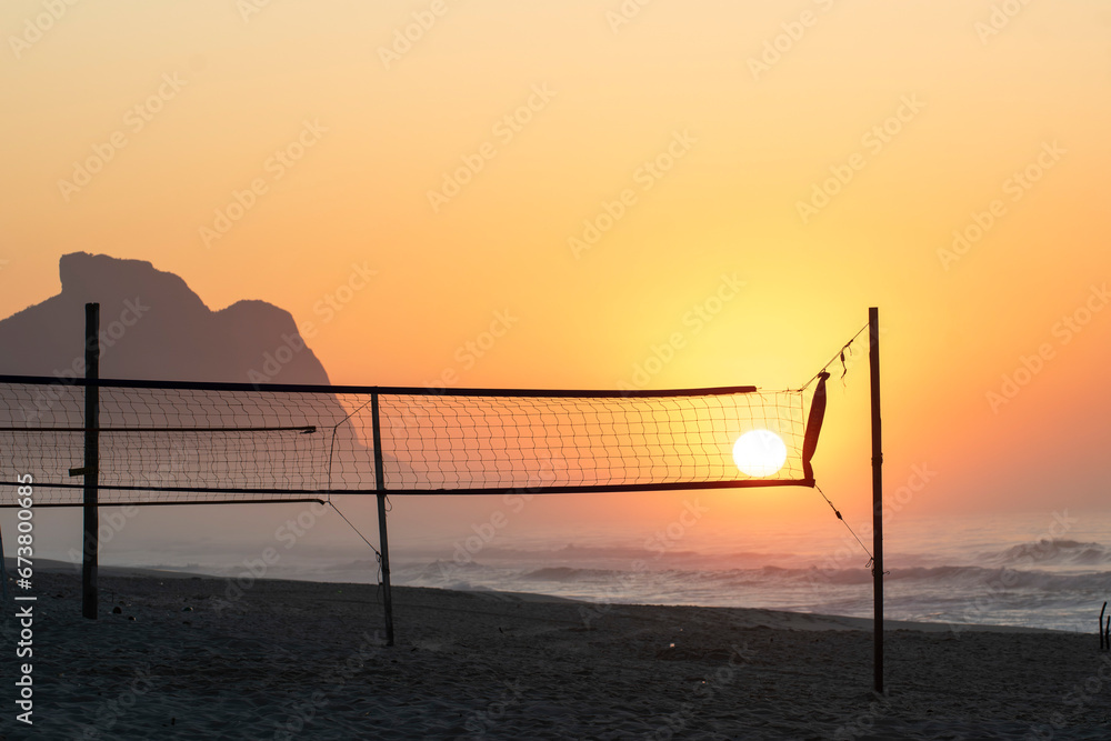 Recreio dos Bandeirantes beach at sunrise with the Pedra da Gavea mountain Recreio dos Bandeirantes beach at sunrise with the Pedra da Gavea mountain