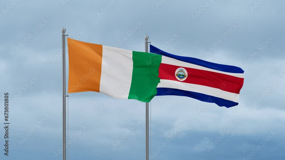 Costa Rico and Ivory Coast, Cote d'Ivoire flag waving together on cloudy sky, endless seamless loop, two country cooperation concept Costa Rico and Ivory Coast, Cote d'Ivoire flag waving together on cloudy sky, endless seamless loop, two country cooperation concept