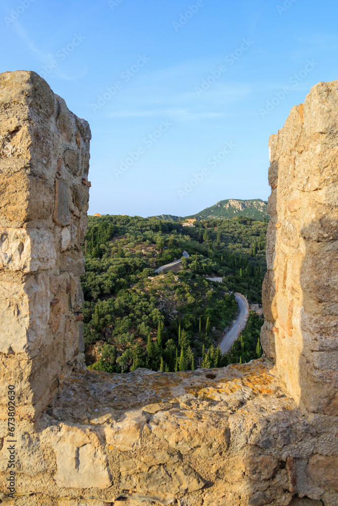 Ruins of Angelokastro Castle in the evening under a blue sky on the island of Corfu