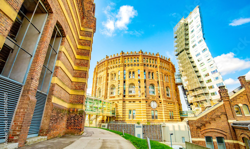 Fotografie Vienna Gasometers buildings over blue sky, Austria
