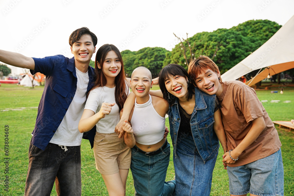 Fototapeta premium Image of a group of young Asian people laughing happily together