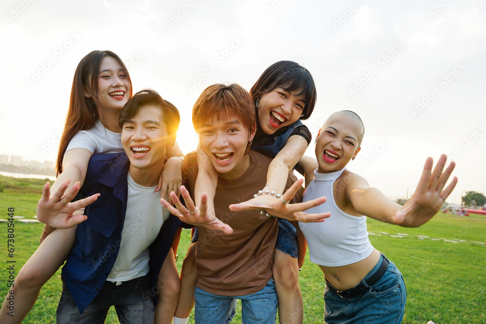 Image of a group of young Asian people laughing happily together