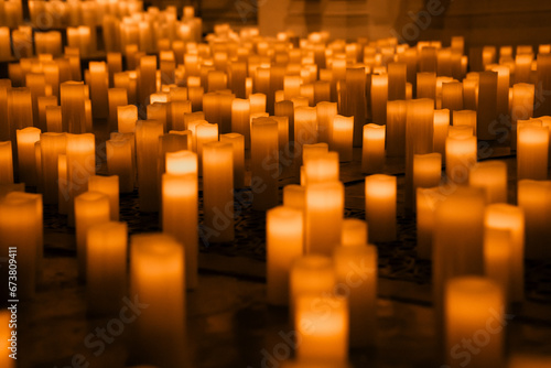 Candles, candle light setting, glowing flames, church setting
