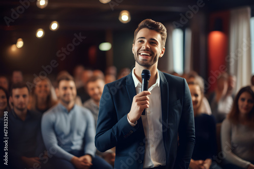 Happy businessman speaking in a conference room photo