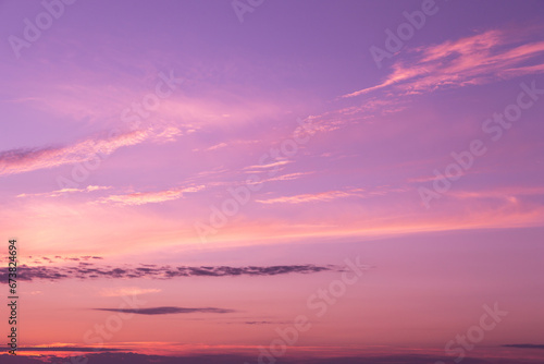 Pink purple violet beautiful sky. Beautiful soft gentle sunrise, sunset with cirrus clouds background texture © Viktor Iden
