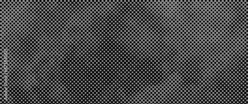 Black halftone texture on grey background. Modern dotted futuristic illustration. Grunge pixilated vector backdrop.