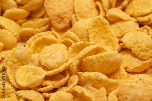 Background of corn flakes close-up. Healthy breakfast