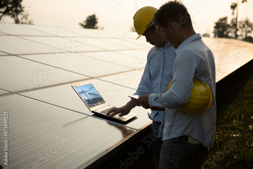 Electrical Engineer Technician Talk to business people to invest in install solar cells outside building or industrial factory. Collaboration on energy reduce for environment. Concept key worker