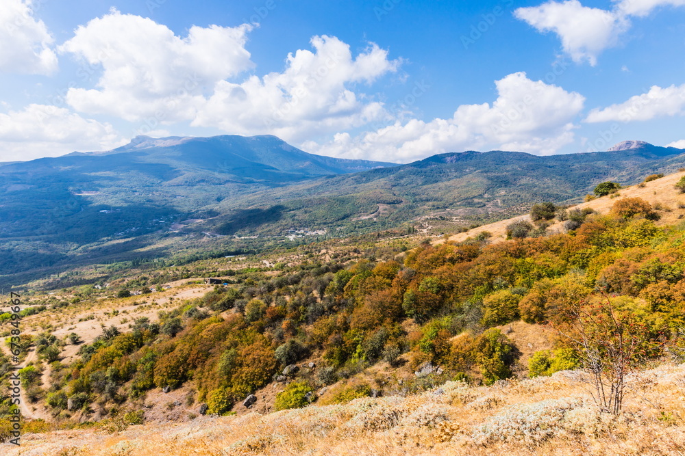 Mysterious mountain landscape of the Valley of Ghosts on the western slope of Mount Demerdzhi in Crimea. Popular tourism and trekking destination Mysterious mountain landscape of the Valley of Ghosts on the western slope of Mount Demerdzhi in Crimea. Popular tourism and trekking destination
