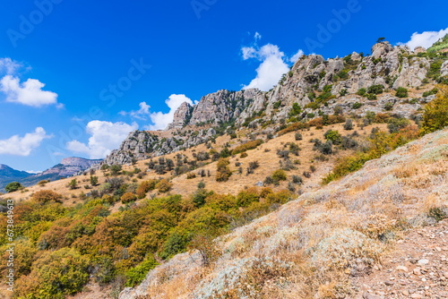 Mysterious mountain landscape of the Valley of Ghosts on the western slope of Mount Demerdzhi in Crimea. Popular tourism and trekking destination