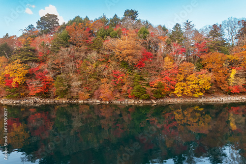 Idyllic landscape of lake and forest of Nikko national park in Japan in autumn season