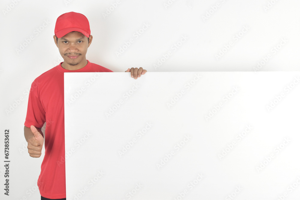 Delivery man holding blank paper with copy space, place for text image. Delivery concept. Delivery man holding blank paper with copy space, place for text image. Delivery concept.