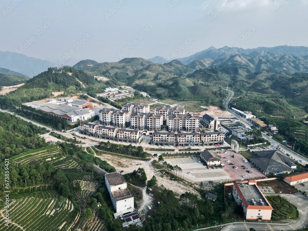 View of a resort in Guangdong, China, featuring lush green lawns, and a picturesque view