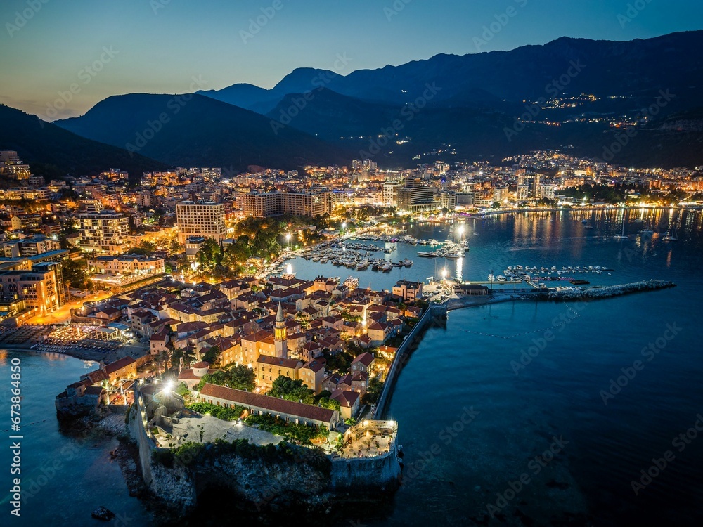Picturesque nighttime aerial view of Budva, Montenegro
