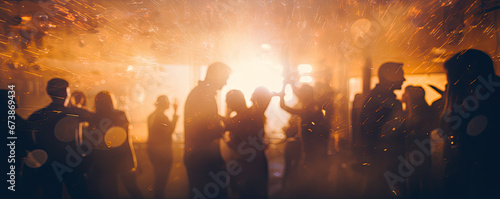 blurred shining background people at party © krissikunterbunt