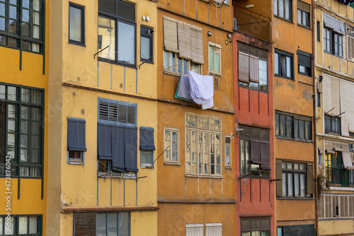 View of the typical and colorful Onyar houses at Girona in Catalonia. These facades are situated over Onyar river. photo