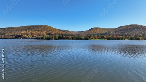 Natures beauty in landscapes in Autumn Fall colors in mountains, hills, valleys and lakeside in countryside in Pennsylvania