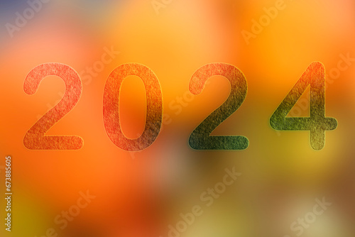 2024, Number 2024 on orange background. Happy New Year