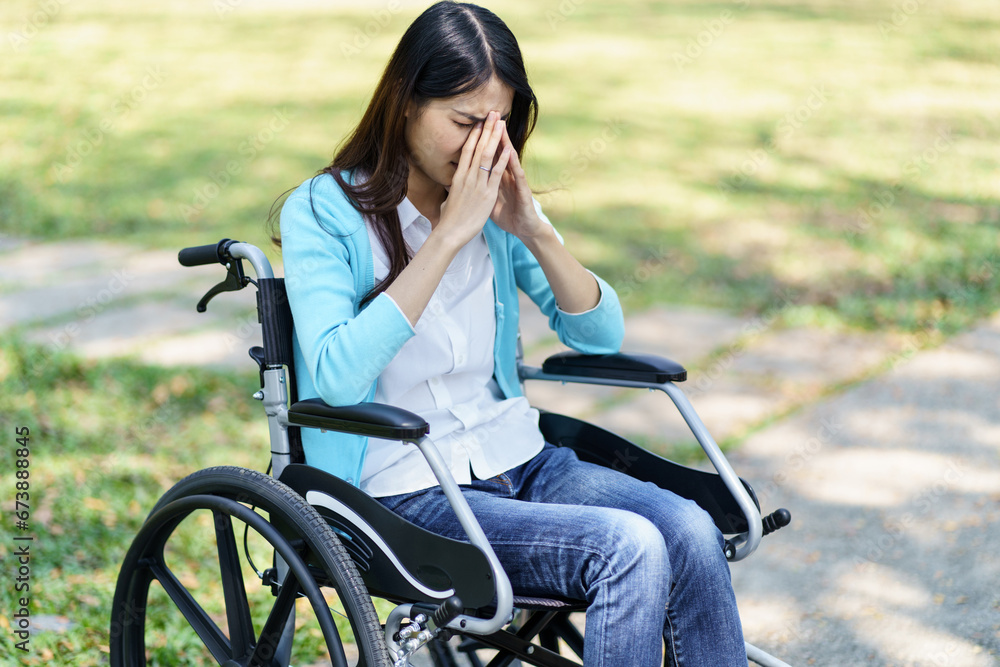 Depressed sad asian woman in wheelchair lonely disabled adult Depressed sad asian woman in wheelchair lonely disabled adult