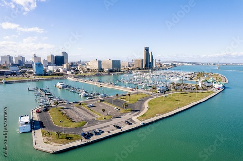 Bild auf Leinwand Aerial view of Corpus Christi Downtown Marina surrounded by buildings
