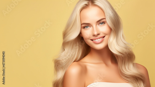 Beautiful elegant european blond-haired smiling young woman with perfect skin and long blond hair, on a lime background, close-up