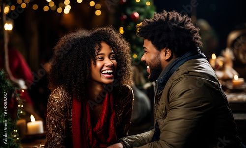 Couple of afro girl and boy laughing with Christmas decorative background