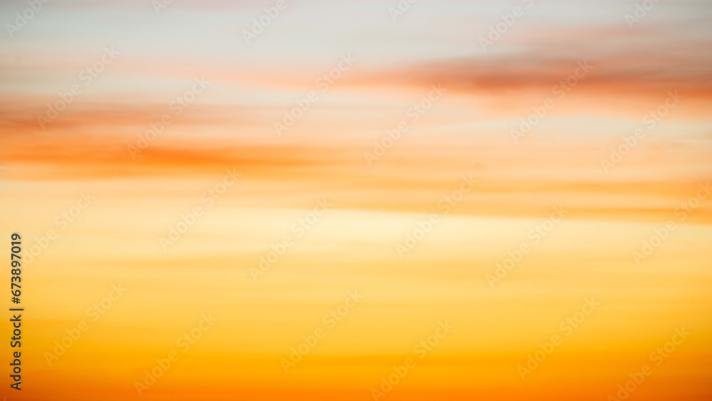 Obraz premium Sky gradient from blue to orange sunset