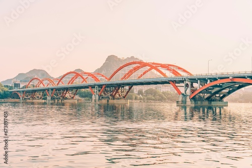 View of Wenhui Bridge over the Liujiang River. Liuzhou, China. photo